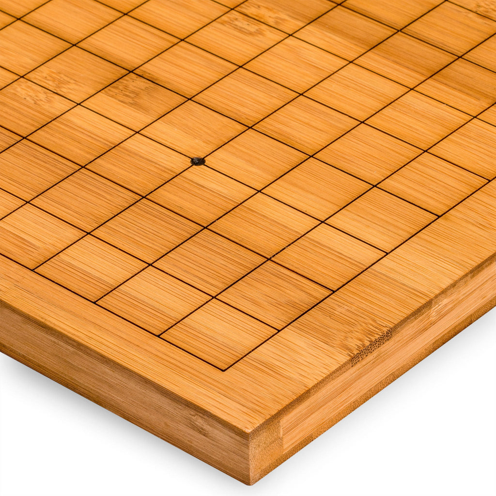https://www.ymimports.com/cdn/shop/files/bamboo-etched-reversible-19x19-13x13-go-game-set-board-0_8-inch-with-double-convex-melamine-stones-and-bamboo-bowls-yellow-mountain-imports-5_1024x1024.jpg?v=1694224912